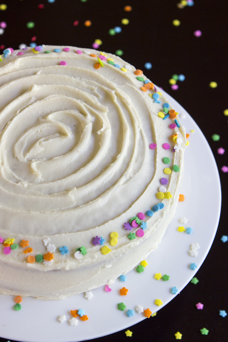 A soft, fluffy vanilla funfetti cake studded with rainbow sprinkles and topped with a rich vanilla buttercream.